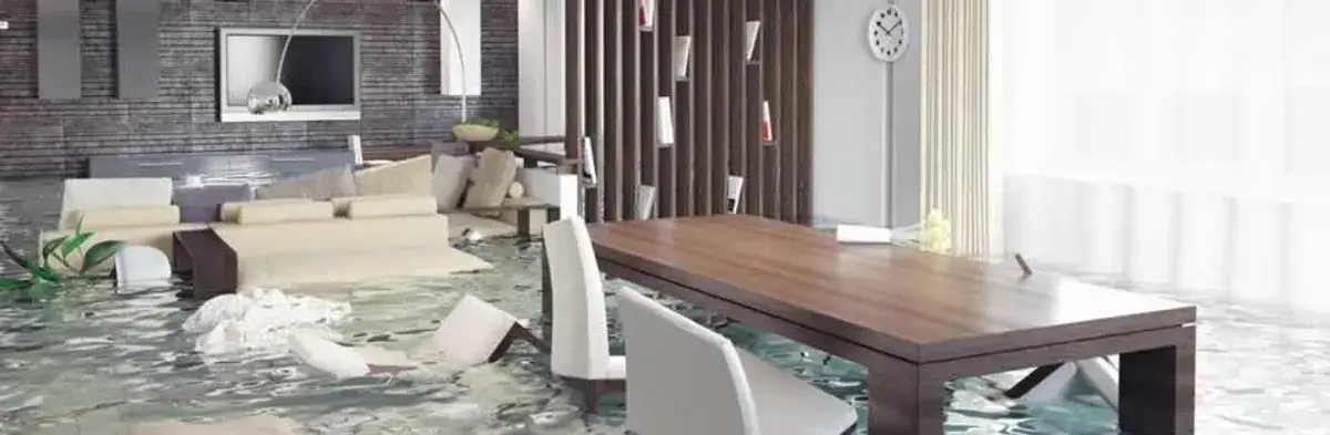 home interior affected by water damage with flooded floors and displaced furniture in Bradenton, FL